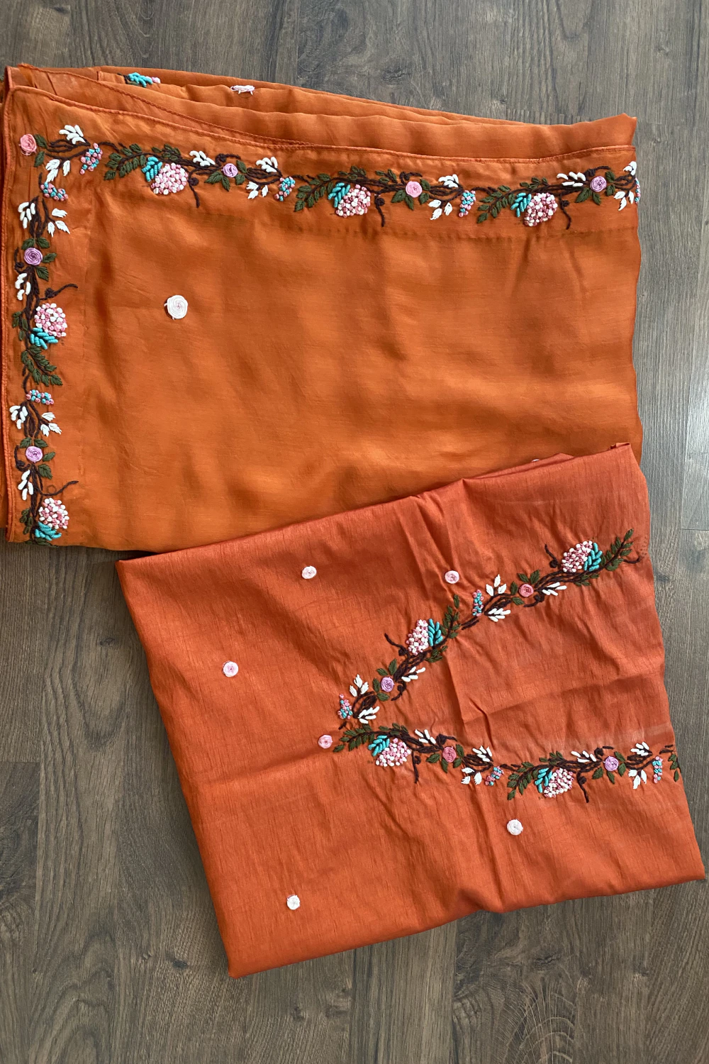 Rust orange thread work saree