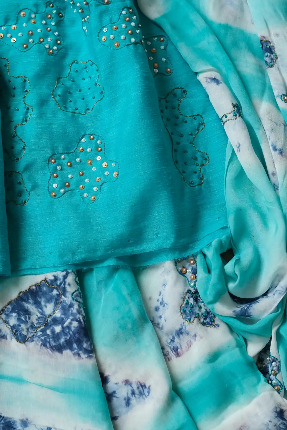 Blue muslin silk hand dyed highlightwork saree