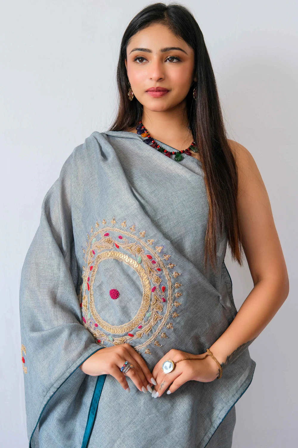 Turquoise jute shimmer marodi work saree