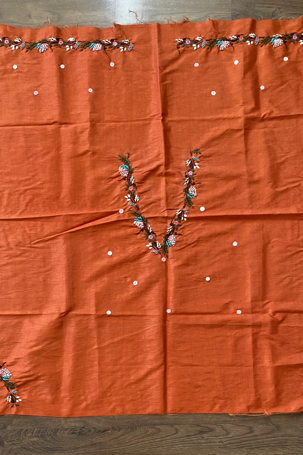 Rust orange thread work saree